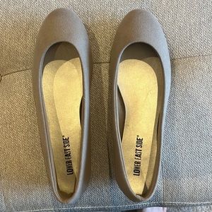Camel color faux suede flats.